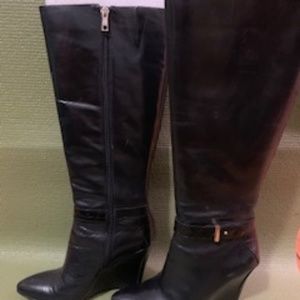 Tall black wedge boots